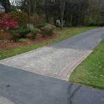 Paver band set into asphalt drive