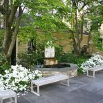 Existing sculptural pieces were featured in a custom fountain and pool on the side of the main patio area.