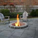 Cobblestone (Belgian Block) fire pit set into a multiple pattern bluestone patio