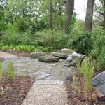 New England Fieldstone defines this rustic sitting area