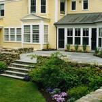 Fieldstone Wall with bluestone patio.  Bluestone steps with fieldstone risers.